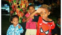 Perayaan Hari Anak Sedunia ditengah maraknya tindakan kekerasan terhadap anak dalam situasi konflik bersenjata Di Papua