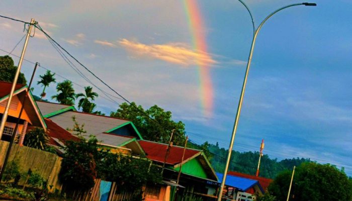 Pelangi di Senja Kota