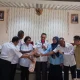 Asisten I Sekda Nabire, La Halim membuka rapat koordinasi lintassektor di aula Bapperinda Kabupaten Nabire, Kamis (5/3/2026). Rapat tersebut digelar untuk menyikapi tingginya kasus malaria yang dinilai mengkhawatirkan. - Ist